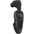 Alpinestars Youth Bionic Plus knæbeskyttere, sort, beskyttelse til motocross og off-road, skal med honeycomb-mønster og hvidt stjernelogo, justerbar lukning med to remme, 3D mesh-bagside for ventilation